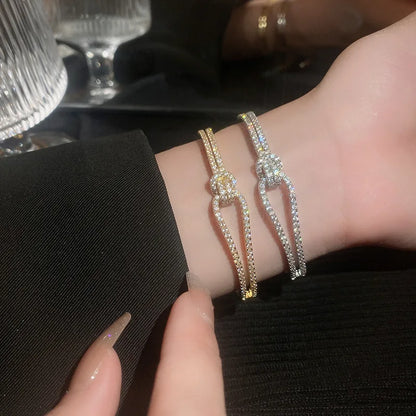 PULSERA NUDO ABIERTO CON DIAMANTES