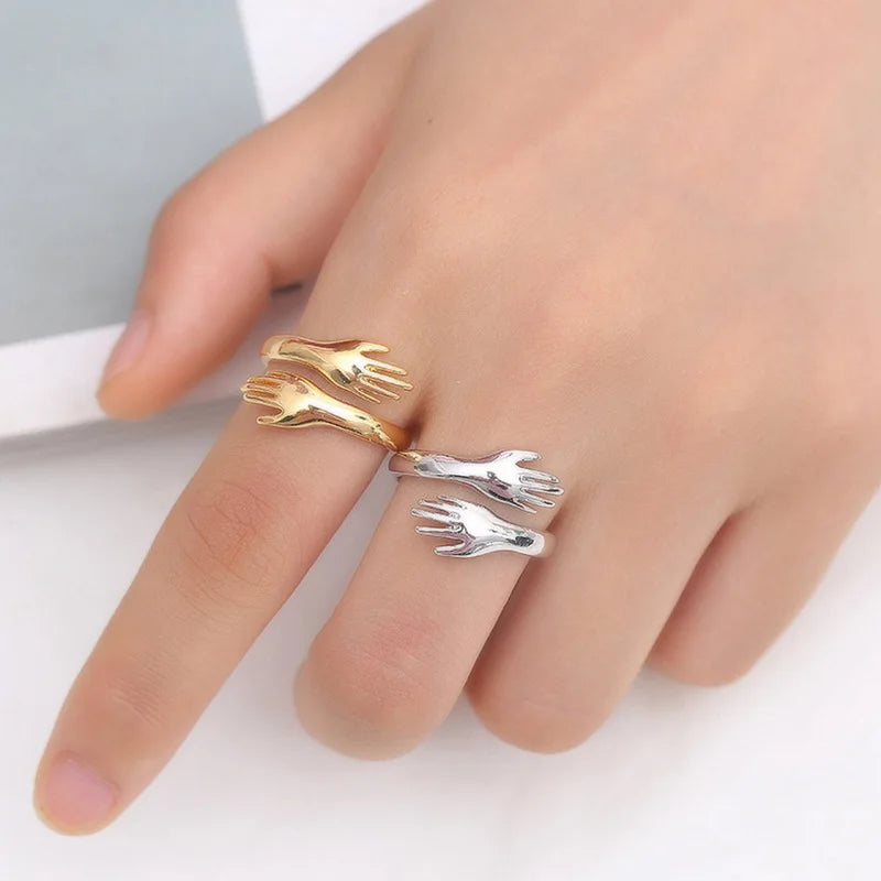 ANILLO MANOS ABRAZADAS