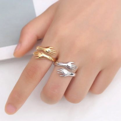 ANILLO MANOS ABRAZADAS