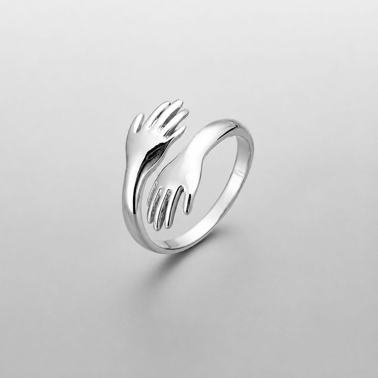 ANILLO MANOS ABRAZADAS